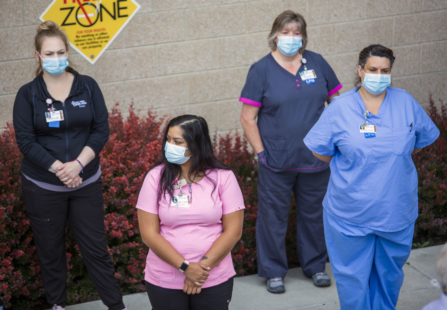 Hospital staff show solidarity with moment of silence